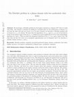 Research paper thumbnail of The Dirichlet problem in a planar domain with two moderately close holes