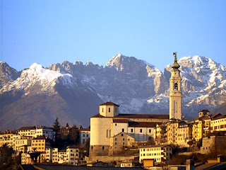 Belluno sits in the shadow of the Dolomites Belluno sits in the shadow of the Dolomites