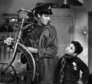 Maggiorani with Enzo Staiola, who played his son, Bruno, in Vittorio de Sica's Bicycle Thieves Maggiorani with Enzo Staiola, who played his son, Bruno, in Vittorio de Sica's Bicycle Thieves
