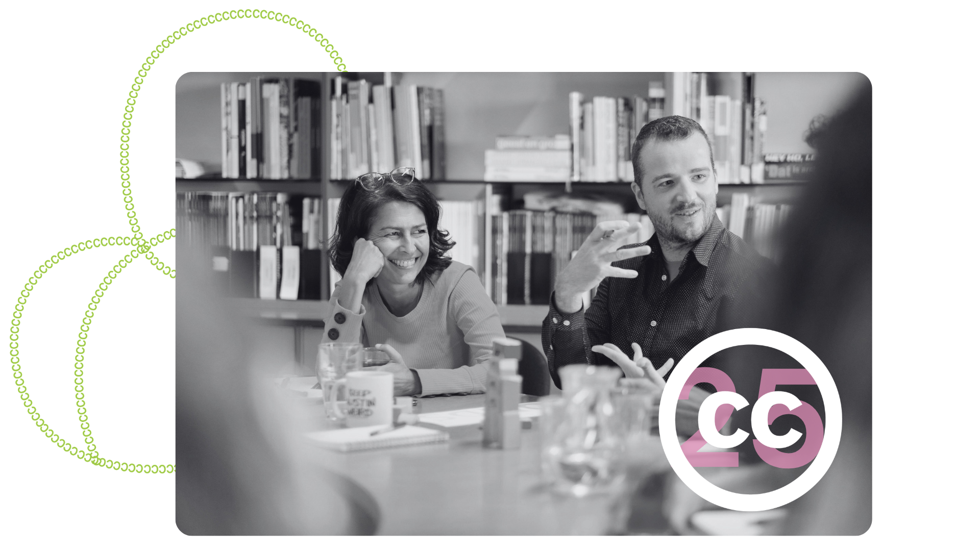 A grayscale photo of two participants at a CC Global Summit.