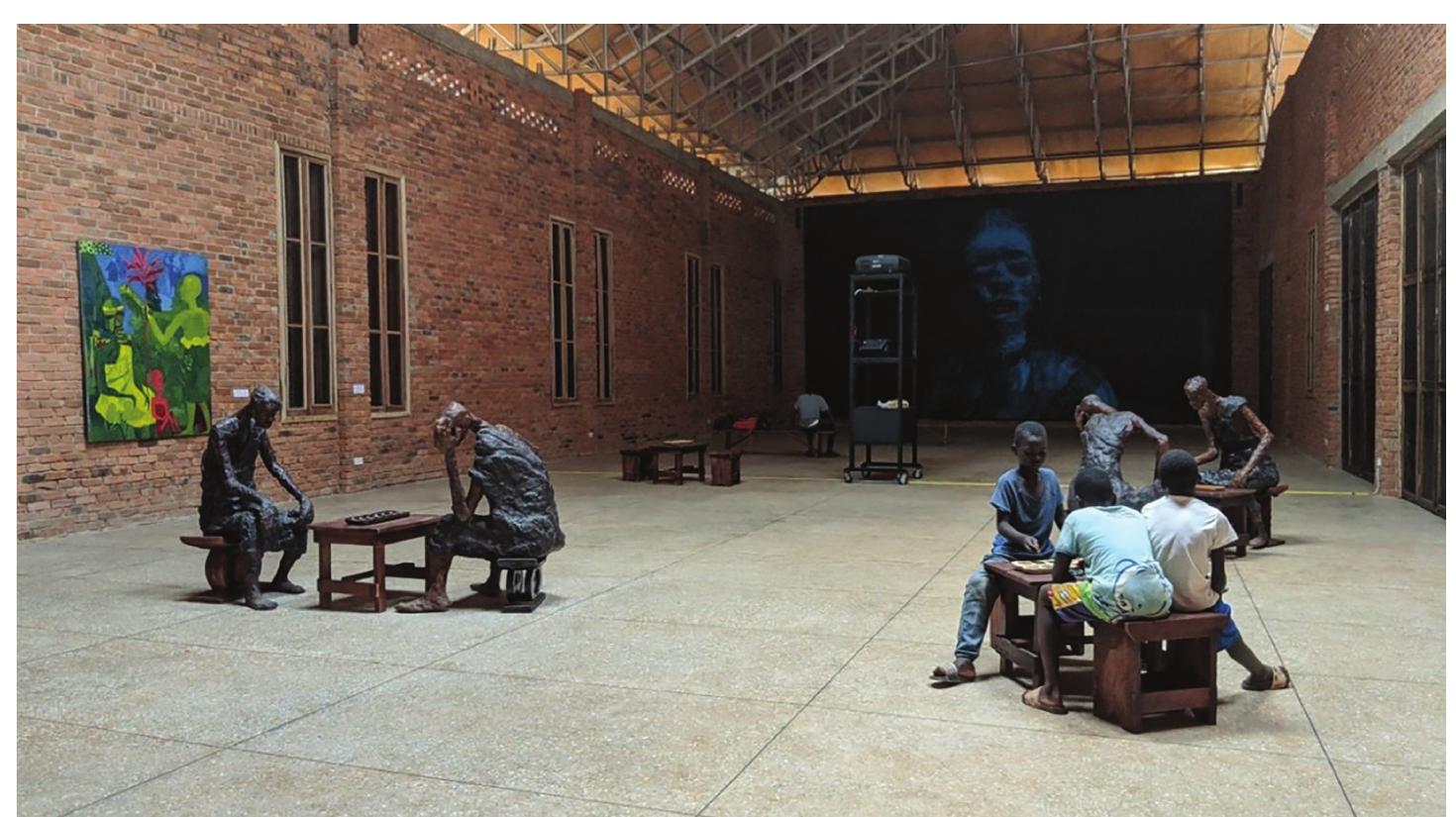 Riskin, Selorm Kudjie, and Patrick Nii Okanta Ankrah at the Kumasi and Sekondi Railway Loco Sheds and tracks. if‘you love me... featured thirty artists and collectives, including Lois Arde-Acquah,”* whose zero gravity Fragments of Styrofoam float in a derelict train car also floating in free space and hoisted on a crane which had been out of use twenty years but repaired and res-  surected by railway engineers for the pur- pose of the exhibition (Fig. 24). 