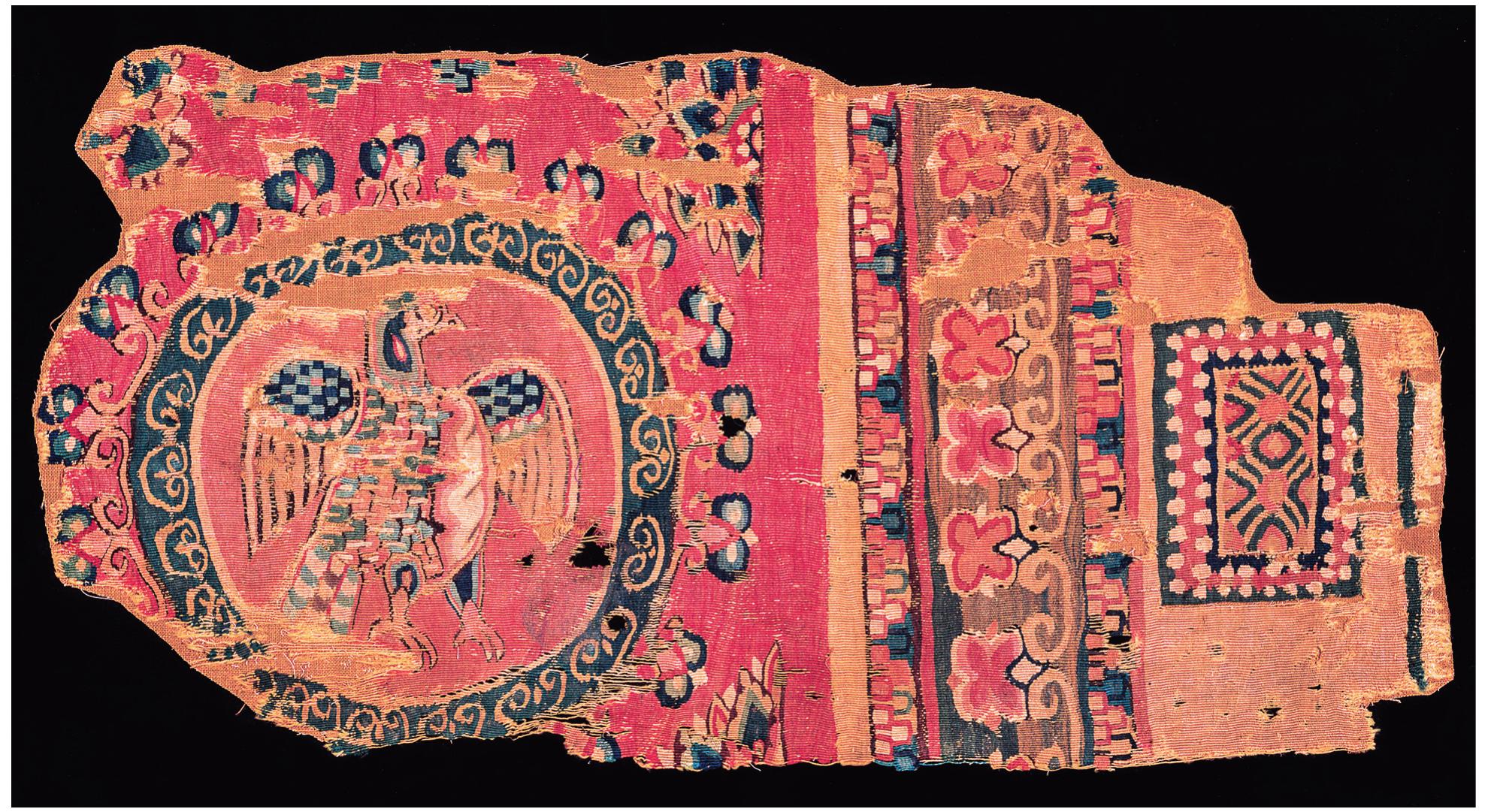 Fig. 10. Fragment with eagle and jeweled border, ca. eighth century, wool, 45 x 23 cm. Montreal Museum of Fine Arts, purchase, D. W. Parker Fund, 1953.Dt.5. Artwork in the public domain; photograph by Christine Guest, provided by MMFA. 