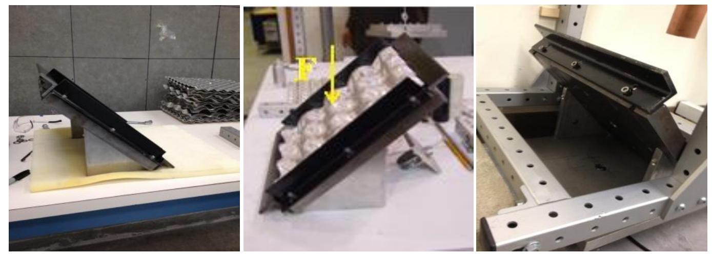 igure 3.5 — 45 Wedges Placed Below Impact Surface for Oblique Loading  tilted support where it is resting on the end bracket to prevent it from sliding. 