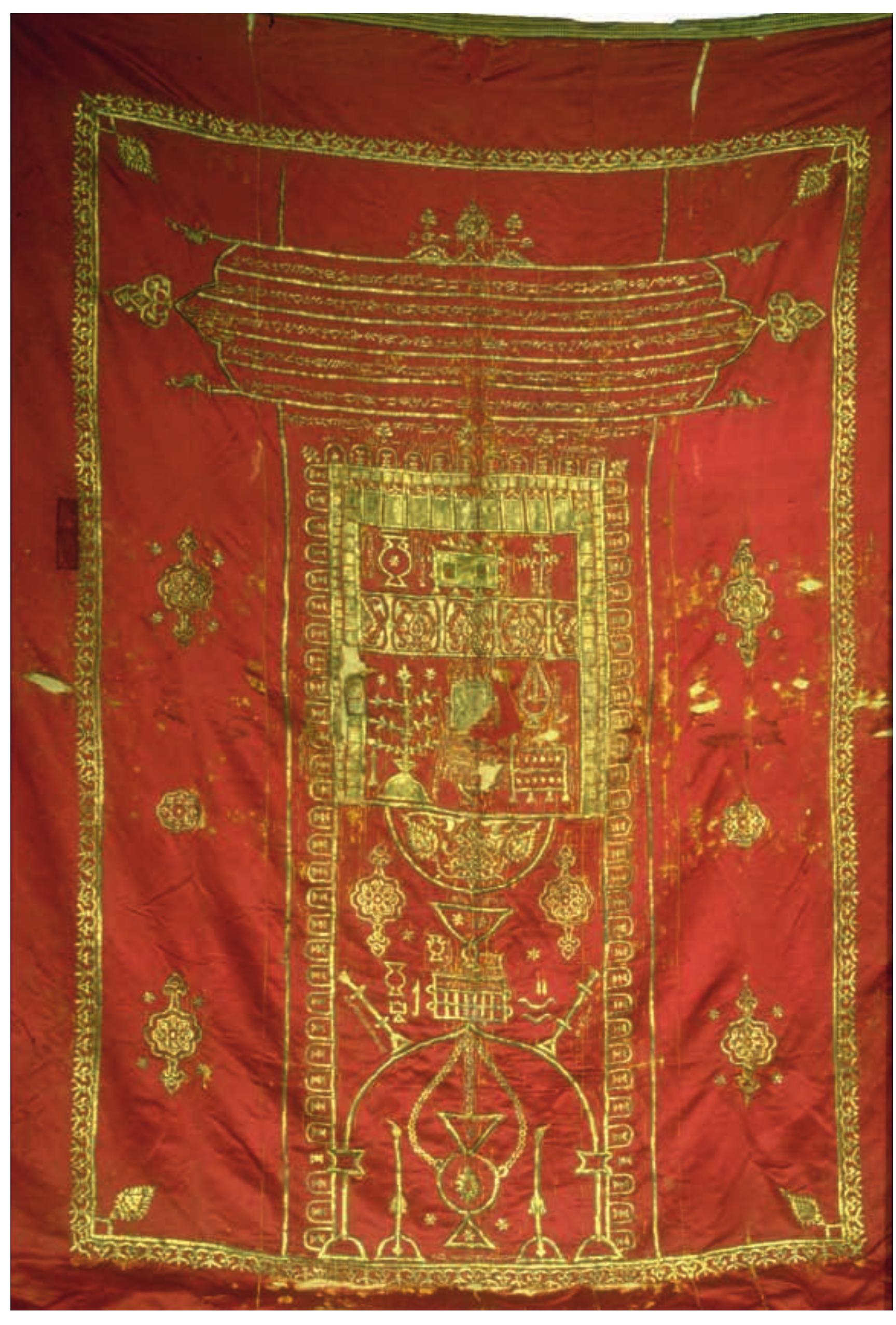 Fig. 16. Torah shrine curtain, Masakh, Damascus, 1509/10, red silk with silver threads. Gift of Jacob, son of Abraham, son of Isaac of Damascus, to the Nablus synagogue. Artisan: Joseph, son of Zedakah the Priest. Synagogue, Kiryat Luza, Mount Gerizim. Courtesy of the Center for Jewish Art, Hebrew University of Jerusalem 