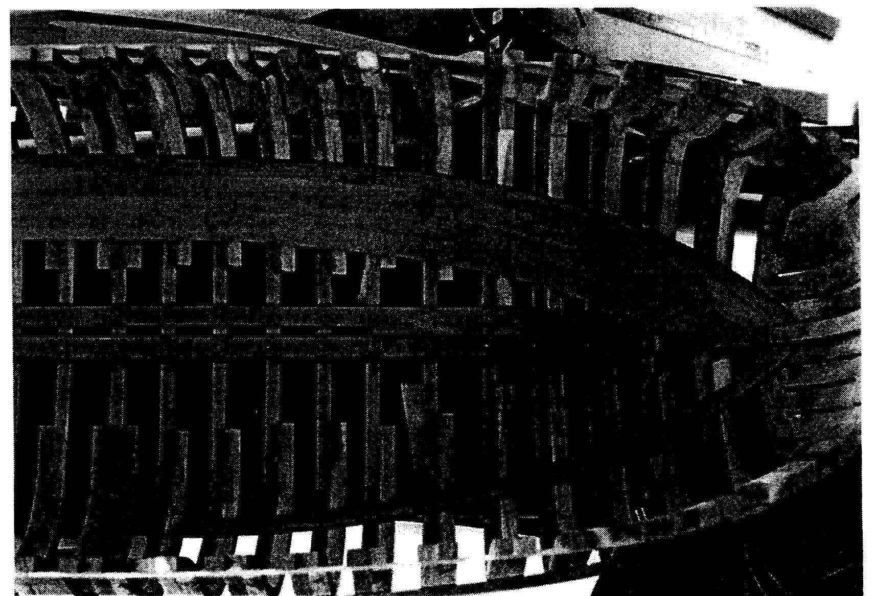 Figure 39. Installation of the ceiling on the model starting with the outermost plank or stringer. Photo by G. Grieco. 