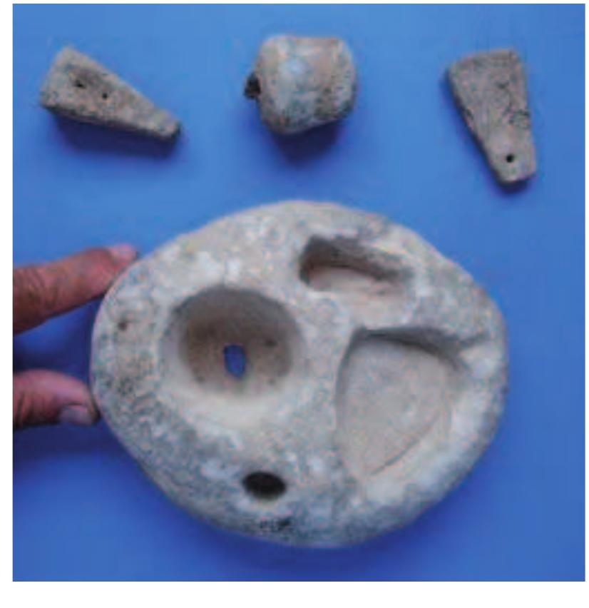 Decorated folded rectangular fishing sinkers (IAA).  A mold for casting hook and line sinkers from the Sea of Galilee (T. Sagiv). 