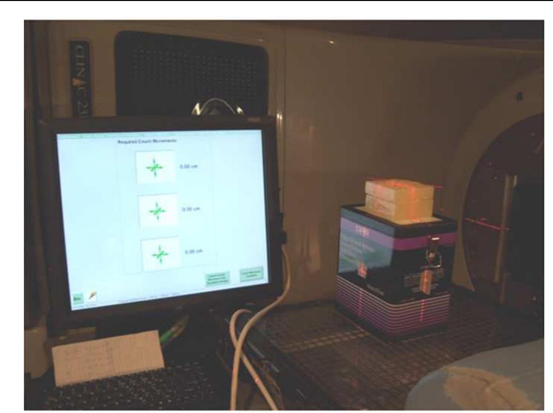 Figure 1. Experimental setup of the US phantom and BAT SXI system. Two layers (3 cm and 2 cm) of fat-simulating material are shown stacked on top of the US phantom. 