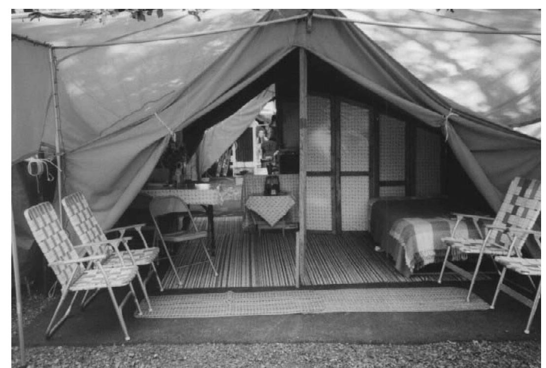 FIGURE 1 Grange Fair Tent.  associations. Its primary purpose at the time was to provide farmers and their families from around the region the opportunity for social interaction (Lathbury, 1999). Over the past 30-40 years, many Grange associations across the nation have dissolved in response to dwindling memberships arising from the decline in family-owned farm operations (Sansom, 2000). However, the Centre County Grange Encampment and Fair remained robust and was the only one in the country that allowed tenting on the fairground for the duration of the event (Lathbury, 1999). 